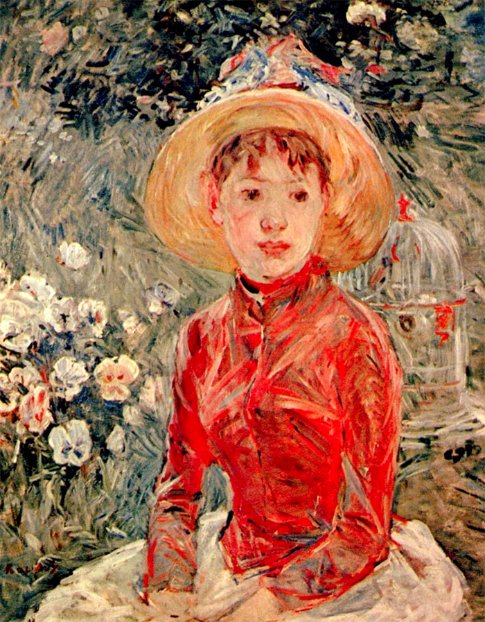 Mädchen sitzt in einer Wiese