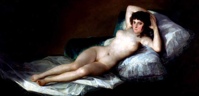 nackte frau auf dem Bett